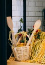 Vertical shot of pasta with wooden spoons in a basket Royalty Free Stock Photo