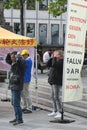 Vertical shot of people demonstrating in Cologne against organ trafficking of Falun Gong members