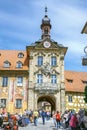 Vertical shot people rising the medieval Old Town Hall in Bamberg Germany on a sunny day