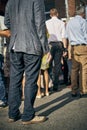 Vertical shot of people standing in the queue for a pub's rush hour in Dublin, Ireland