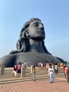 Vertical shot of people visiting the Adiyogi statue in India