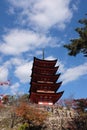 Vertical shot of people walking up the Miyajima pagoda in Japan Royalty Free Stock Photo