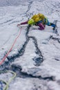 Vertical shot of a person climbing a rock in the Alps in Austria - overcoming challenges concept