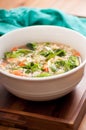 Vertical shot of pho soup with fresh chicken and vegetables, ramen noodles and onion Royalty Free Stock Photo