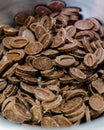 Vertical shot of a pile of tasty chocolate candies in a bowl