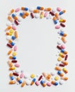 Vertical shot of a pill picture frame on a white surface - great fro a background