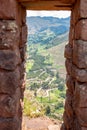 Vertical shot of the Pisac City Trough the Window of Ancient Incan