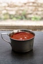 Vertical shot of a plate of ketchup sauce