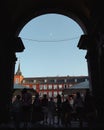 Vertical shot of the Plaza Mayor seen through the arch in Madrid, Spain on a sunny day Royalty Free Stock Photo