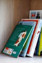 Vertical shot of Polish child books on a shelf