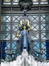 Vertical shot of the Queen of Time stands on the prow in London