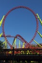 Vertical shot with a red roller coaster loop Royalty Free Stock Photo