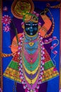 Vertical shot of a religious painting in Shrinathji temple in Nathdwara, India