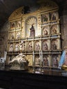 A vertical shot of religious sculptures in San Agustin Church