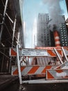 Vertical shot of repairing road barriers on the streets of New York Royalty Free Stock Photo