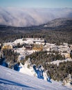 Vertical shot of a resort surrounded by forests, Kopaonik mountain, Serbia Royalty Free Stock Photo