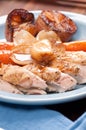 Vertical shot of roasted chicken dinner with potato and vegetables Royalty Free Stock Photo