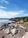 Vertical shot of the rocky beach. Cape Breton Highlands, Nova Scotia, Canada. Royalty Free Stock Photo