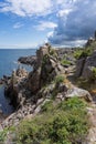 Vertical shot of the rocky coast in Svaneke on the island of Bornholm, Denmark