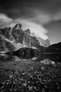 Vertical shot of the rocky mountains reflecting in the lake, Lago Rienza, Italy, Europe