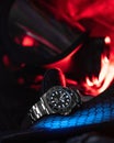 Vertical shot of a Rolex Submariner Steel waterproof wristwatch