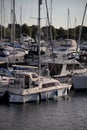Vertical shot of row of empty docked boats at Chatham Harbor in the UK