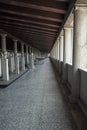 Vertical shot of rows of columns of the ancient temple in the Athenian Agora