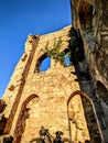 Vertical shot of ruined castle walls on a sunny day Royalty Free Stock Photo