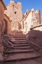 Vertical shot of ruined houses with stairs in Ait Ben Haddou kasbah, Morocco Royalty Free Stock Photo