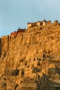 Vertical shot of the ruins of the Guge Dynasty in Zada County at sunrise