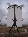 Vertical shot of a rural windmill in Campo de Criptana, Ciudad Real, Spain