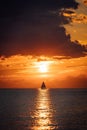 Vertical shot of a sailboat against scenic sunset in Sister Bay, Door County, Wisconsin, USA Royalty Free Stock Photo