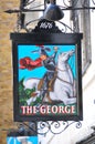 Vertical shot of Saint George's picture sign on an old pub in London, United Kingdom