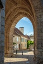 Vertical shot of the Saint Maur church in Martel, Lot, France during d