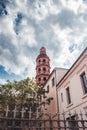 Vertical shot of Saint Sernin basilica in Toulouse with a cloudy blue sky in the background, France Royalty Free Stock Photo