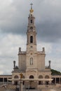 Vertical shot of Sanctuary of Fatima, Portugal against the cloudy sky Royalty Free Stock Photo
