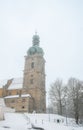 Vertical shot of Sanctuary of Maria Hilf's tower on a snowy winter day