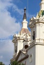 Vertical shot of the Sanctuary of Our Lady of the Holy Fountain in Spain against the blue sky