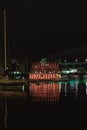 Vertical shot of the Sauna house in Tromso harbor at night. Norway Royalty Free Stock Photo