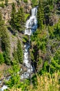 Vertical shot of scenic waterfalls in the Yellowstone National Park Royalty Free Stock Photo