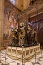Vertical shot of the sculpture of Cristopher Columbus inside the cathedral of Seville, Spain