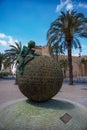Vertical shot of a sculpture in front of the Elche castle Royalty Free Stock Photo