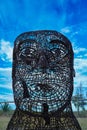 Vertical shot of the Sculpture with human face on Gold Coast Beach