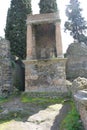 Vertical shot of sculptures in ruins in Pompeii Italy