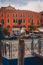 Vertical shot of a seagull perched on a wooden pole Royalty Free Stock Photo