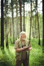 Elderly Scientist Making Notes In Forest Royalty Free Stock Photo