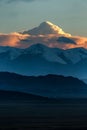 Vertical shot of serene Himalayan mountains at a cloudy sunset in Tibet, China