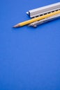 Vertical shot of a set of technical drawing tools on a blue background with a copy space Royalty Free Stock Photo