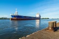 Vertical shot of a ship coming ashore in Sulina port, Romania