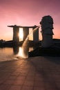 Vertical shot of the silhouette of the Marina Bay Sands hotel against the bright golden sunset Royalty Free Stock Photo